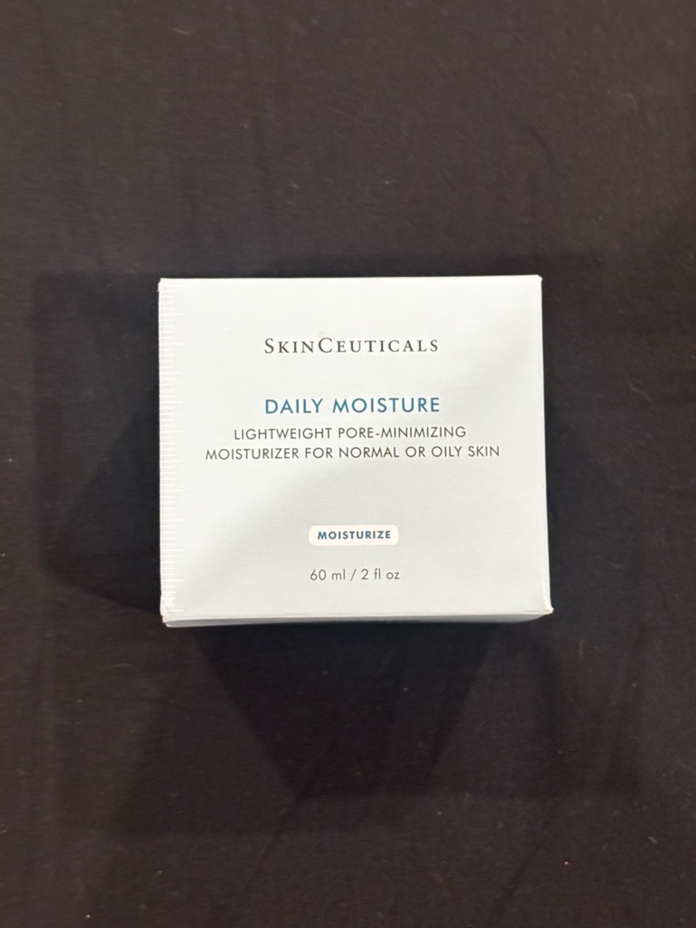 SkinCeuticals Daily Moisture - White and Light Blue Packaging